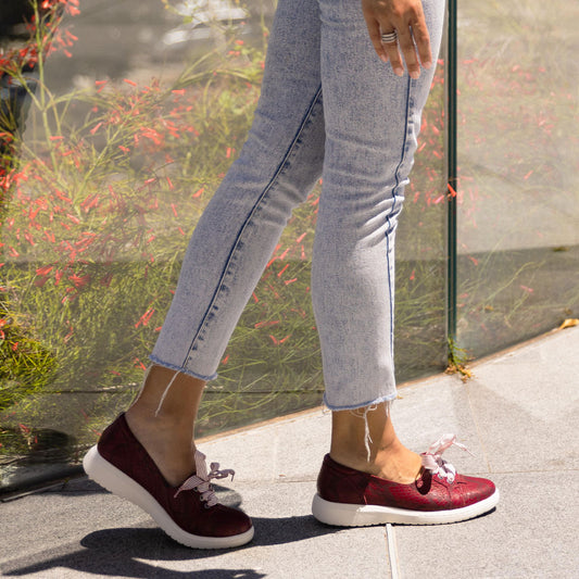 Lifestyle image for Bridgette Slip-On Sneaker - Burgundy Snake
