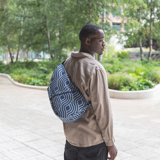 Lifestyle image for Reversible Print Backpack - Blue Wave