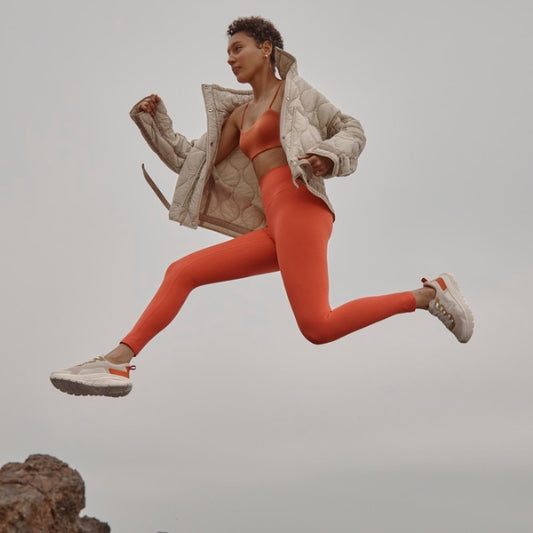 Lifestyle image for Walk Max Lace Up Sneaker - Tangerine