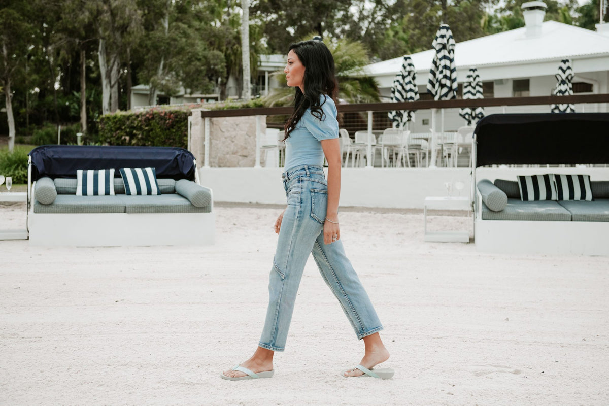 Woman in summer sandals walking outdoors